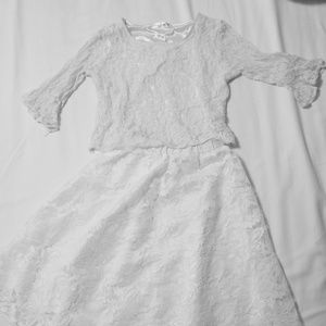 Two piece white laced top and bottom.